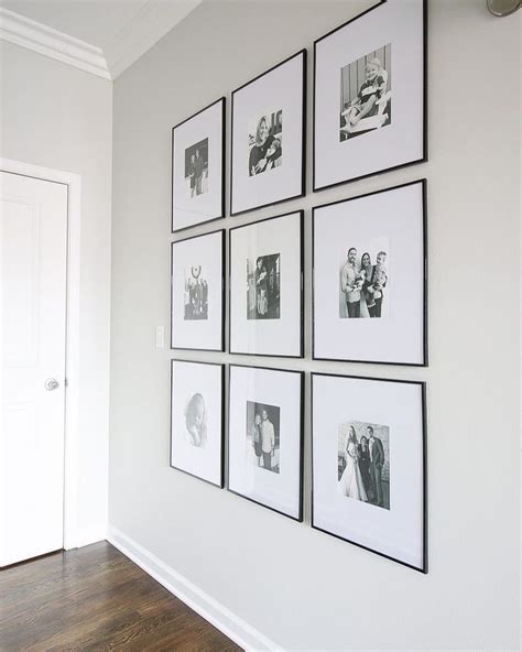 COOL ELEGANCE || Loving these black and white family photos framed in wide mats and thin black ...