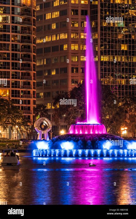 Colorful Lake Eola Park fountain in downtown Orlando, Florida. (USA ...