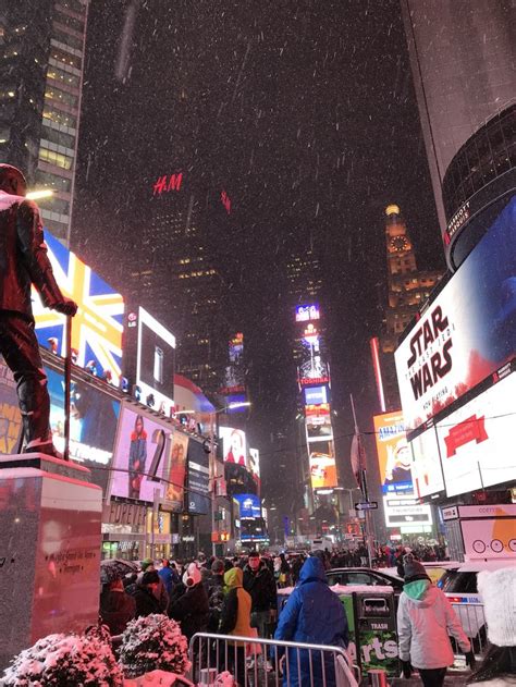 Times Square in the snow- A New York City Christmas – Striped Pineapple | New york city ...