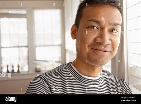 Smiling Malaysian man Stock Photo - Alamy