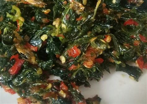 Resep Tumis Daun Singkong Pedas oleh Nur Qomariah - Cookpad