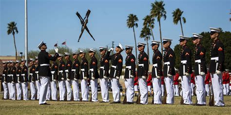 USMC Silent Drill Platoon performs during the Battle Color Ceremony at ...