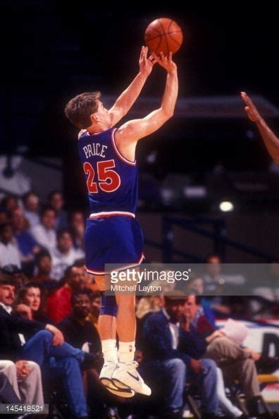 Mark Price of the Cleveland Cavaliers takes a jump shot during a...