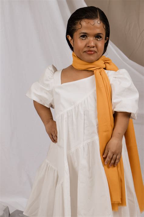 Woman with Dwarfism Modeling a Dress - Photos by Canva