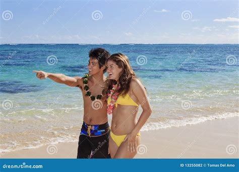 Couple in Hawaii on the Beach Stock Photo - Image of pacific, flirt: 13255082