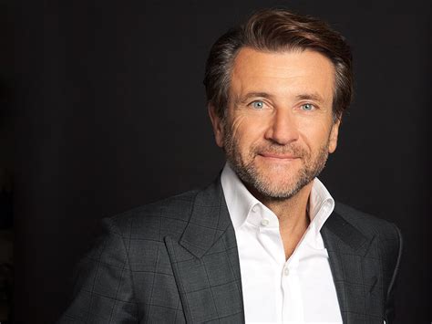 How Robert Herjavec's summer stacking boxes shaped his business future ...