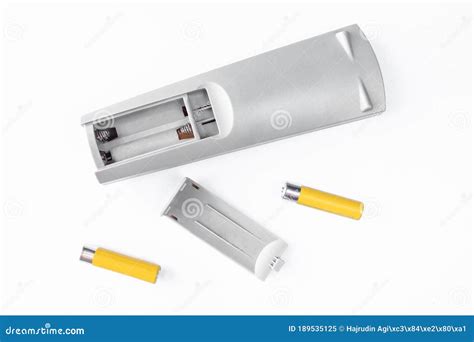 TV Remote Control and Yellow Batteries Isolated on White Background ...