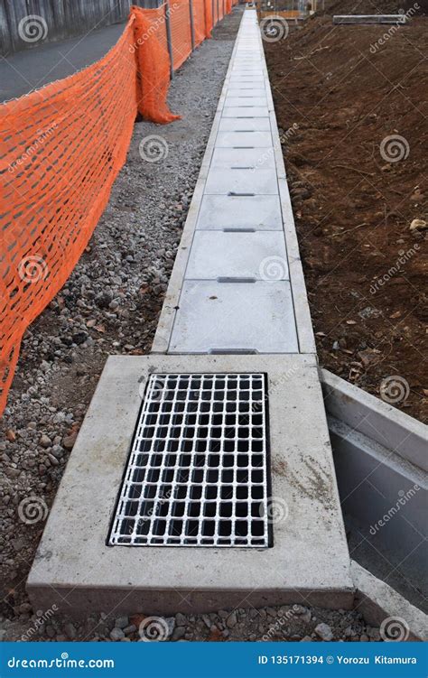 Street gutter construction stock photo. Image of industry - 135171394