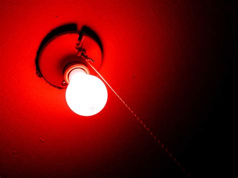 Instead of a black light, I liked putting a red light bulb in my ceiling light. No improper ...