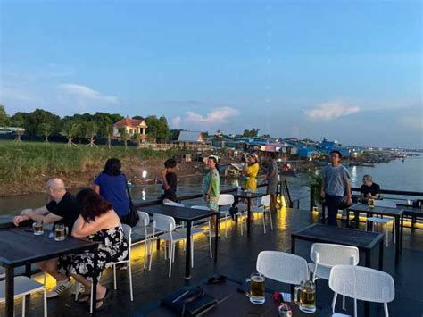 Phnom Penh: Mekong River Sunset Cruise with free flow drink | GetYourGuide