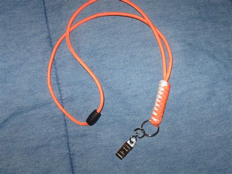 Paracord lanyard for work. Neon orange and white, with a clip for my ID ...