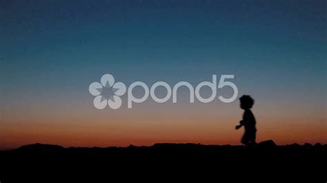 Silhouette Kid Running At Sunset Stock Video 41580177 | HD Stock Footage | Kids silhouette ...