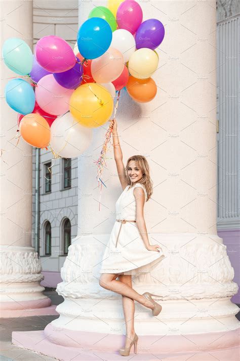 Pretty girl with bunch of balloons. by nikkolia on @creativemarket ...