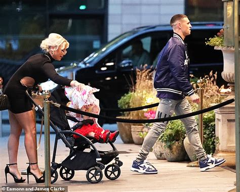 Phil Foden cuts a casual figure as he heads out for a family dinner with his girlfriend Rebecca ...