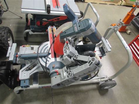 BOSCH T4B GRAVITY RISE STAND & BOSCH DUAL BEVEL MITER SAW - Able Auctions