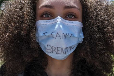 When coronavirus masks become 'I can't breathe' protest signs - Social Good