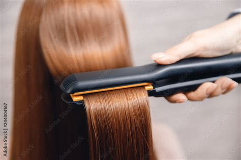 Keratin recovery hair and protein treatment pile with professional ultrasonic iron tool. Concept ...