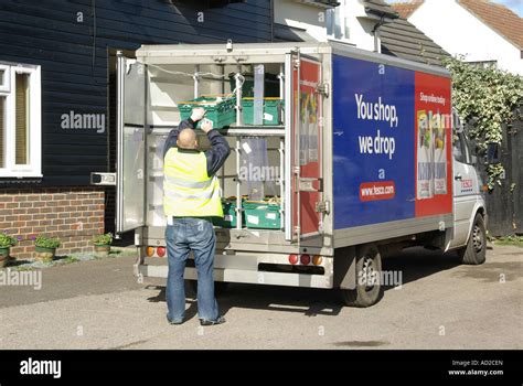 Tesco home delivery van delivering groceries from local store that ...