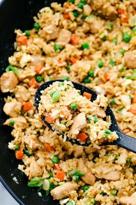 This chicken fried rice has moist and tender chicken with flavorful peas and carrots an… in 2020 ...