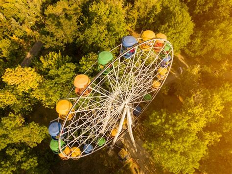 Premium Photo | Aerial top directly above view of ferris wheel in ...