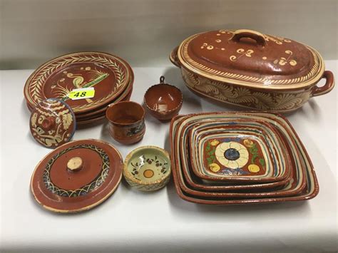 Sold Price: 12 PIECES MEXICAN CLAY POTTERY, 4 DINNER PLATES, 2 LIDS ...