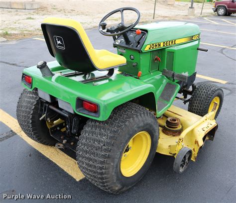 1986 John Deere 420 lawn mower in Wamego, KS | Item DM9301 sold | Purple Wave