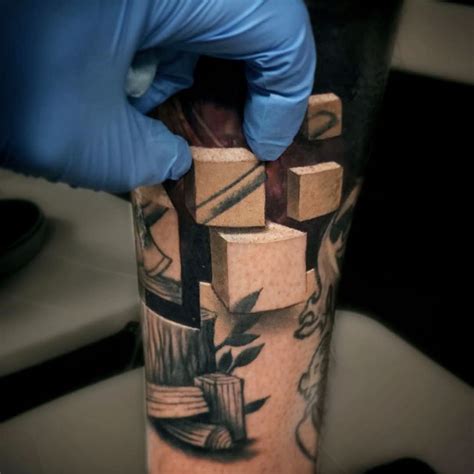 Optical Illusion Tattoos Reveal Worlds Beneath Skin by Jesse Rix – Scene360