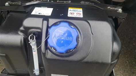 What is diesel exhaust fluid (AdBlue) and why is it used?