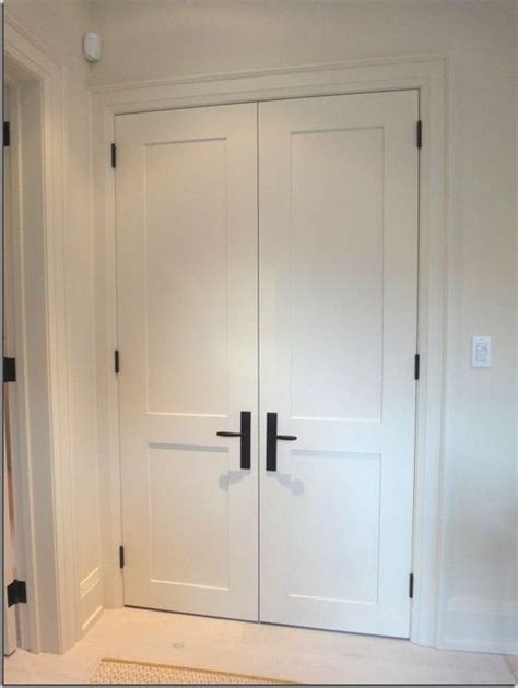 White interior doors with black hardware photo | White interior doors, Bedroom door handles ...