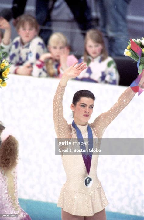 Figure skater Nancy Kerrigan of the U.S.A. is awarded the silver... News Photo - Getty Images