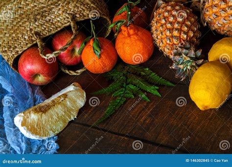 Photo of Basket Full with Delicious Tropical Fruits on the Table. Stock Image - Image of ...