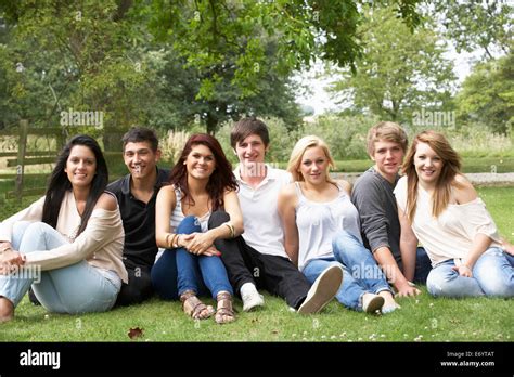 Group of young people outdoors Stock Photo - Alamy