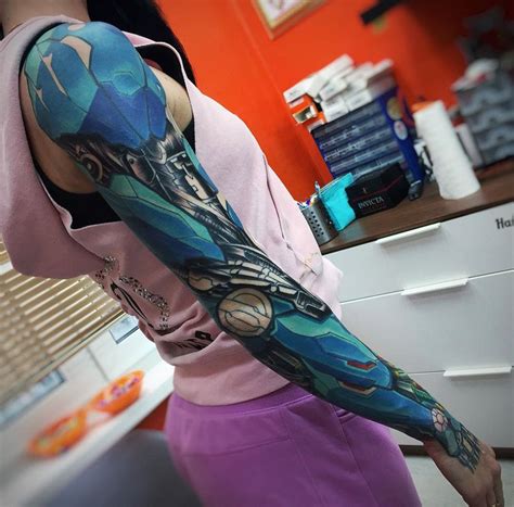 Biomechanical sleeve with blue armor, by EL Tattoo, an artist based in ...