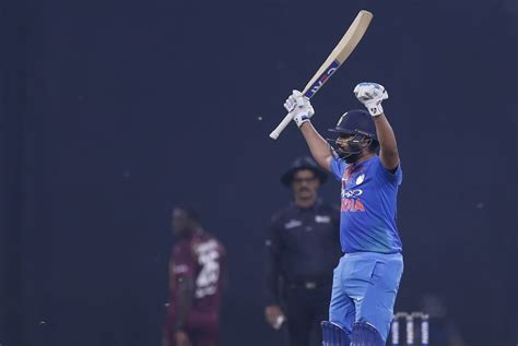 Rohit Sharma salutes the crowd after scoring a century | ESPNcricinfo.com