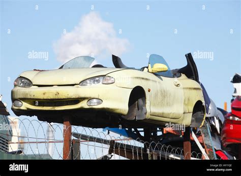 scrap metal car on scrap yard Stock Photo - Alamy