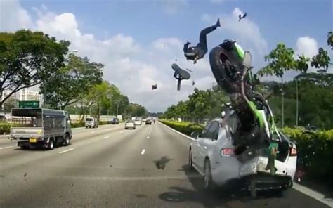 WATCH: Spectacular motorbike accident caught on camera in Singapore