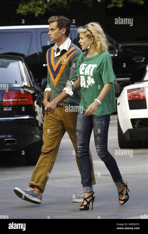 Angel McCord shows her support for the Celtics as she arrives at the ...