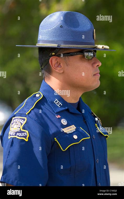 Louisiana State Trooper watches over a demonstration in Baton Rouge ...