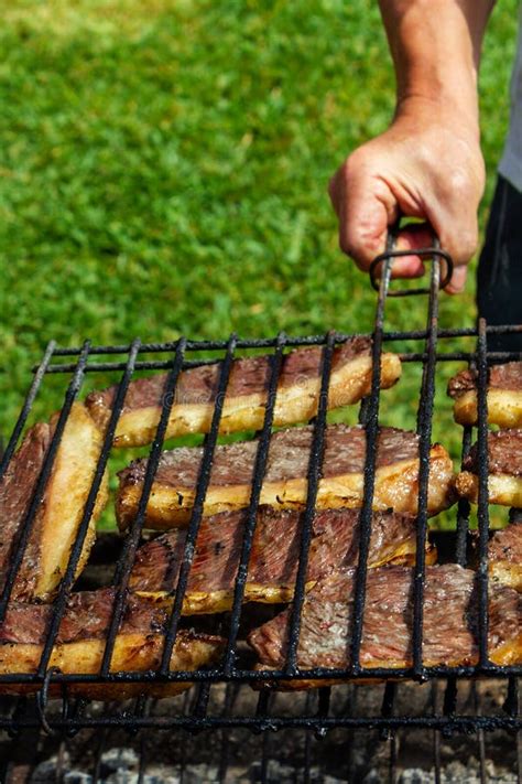 Person Cooking Steaks on a Barbecue Grill Stock Photo - Image of ...