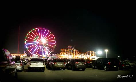 Ferris wheel at night | Amusement park rides, Ocean city, Amusement park