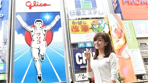 Where is the best place to photograph the Dotonbori Glico sign? | Glico Global Official Site