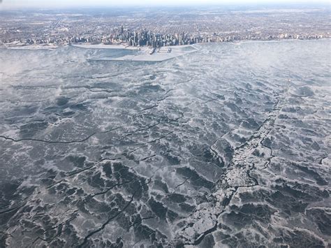 In pictures: Lake Michigan completely freezes amid extremely dangerous temperatures - Strange Sounds