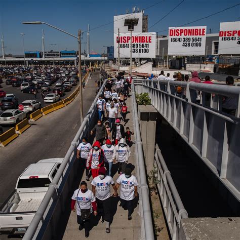 Migrants Mass at U.S.-Mexico Border, Pinning Hopes on Biden - WSJ