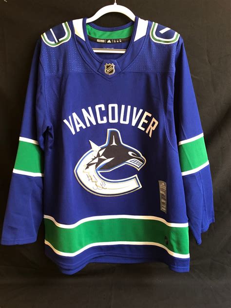 HENRIK SEDIN SIGNED ADIDAS CANUCKS HOCKEY JERSEY