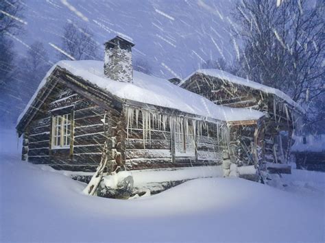 My family's 200-year-old cabin during a snowstorm this morning, deep in ...