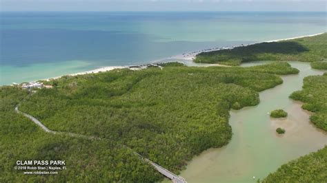 Aerial Video of Clam Pass Beach Park, Boardwalk, and Clam Pass - YouTube