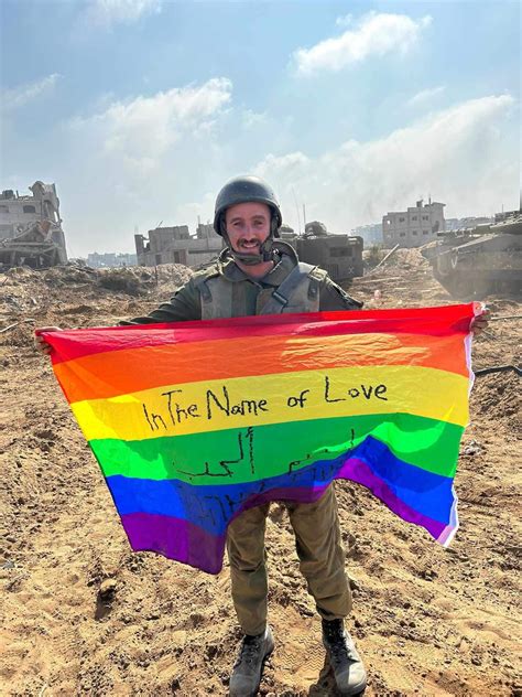 G@y Israeli soldier proudly displays LGBTQ flag on Gaza soil in war ...