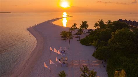 Enjoy the Magical Time of the Gloaming at Kuredu Maldives' Sandbank