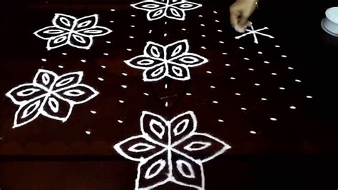 Beautiful flowers kolam with 13-7 middle| chukkala muggulu with dots| rangoli design - YouTube