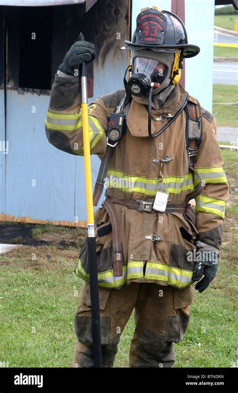 portrait of a firefighter in full turnout gear Stock Photo - Alamy